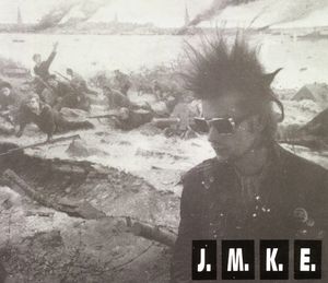 J.M.K.E.