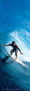 SURFER RIDING THE TUBE
