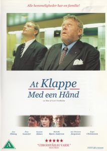 At klappe med en hånd