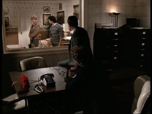 Murder Through The Looking Glass